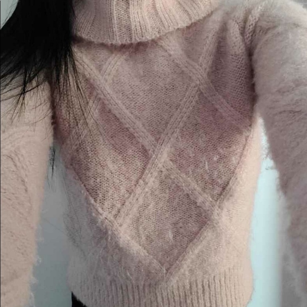Pink turtleneck sweater